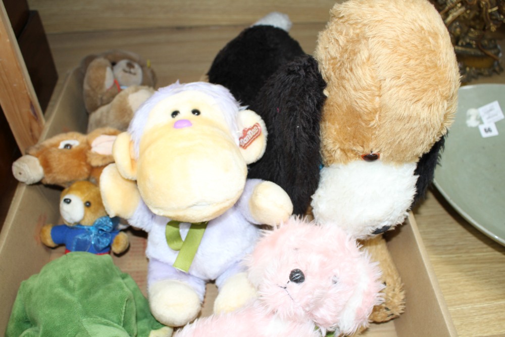 A group of assorted soft toys